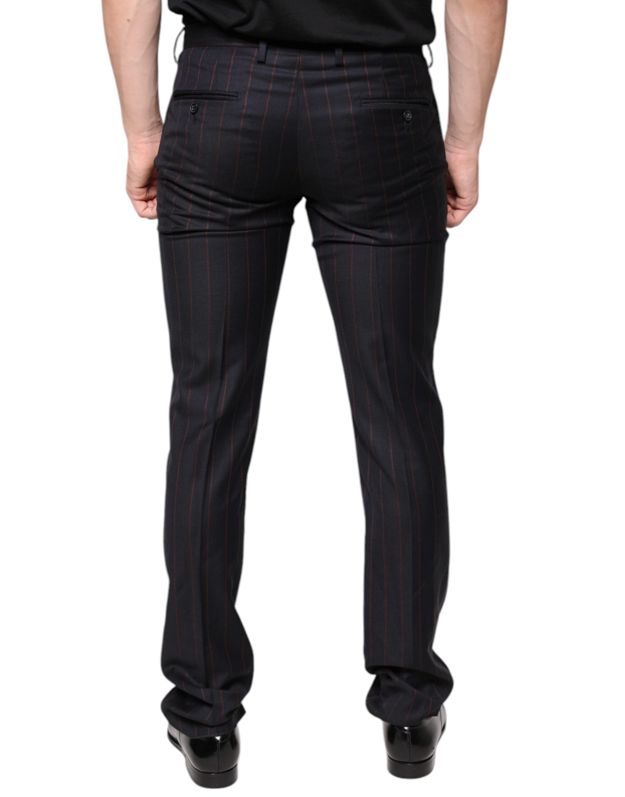 Black striped skinny men's dress pants by Dolce & Gabbana, tailored fit with sleek design for formal or stylish occasions.