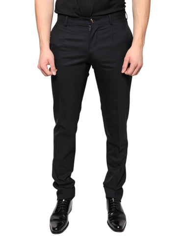 Black wool skinny men's dress pants by Dolce & Gabbana, front view showing tailored fit and sleek design.