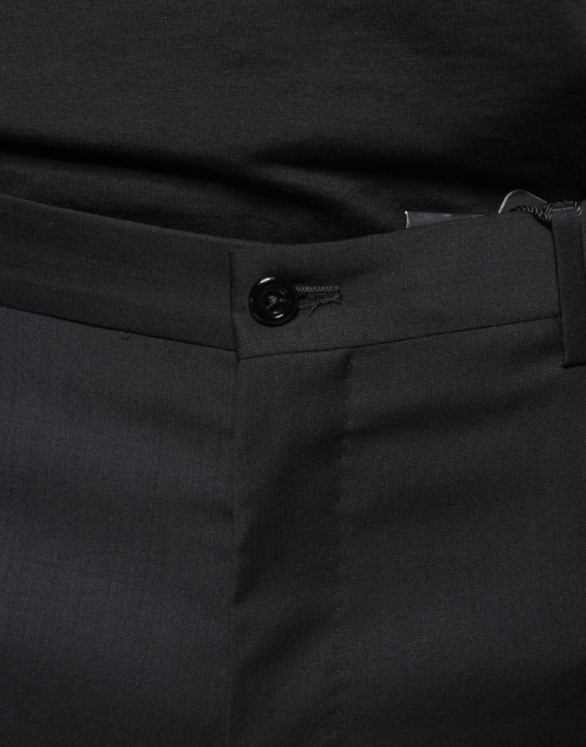 Black wool skinny men's dress pants by Dolce & Gabbana, tailored fit with smooth fabric and classic style.