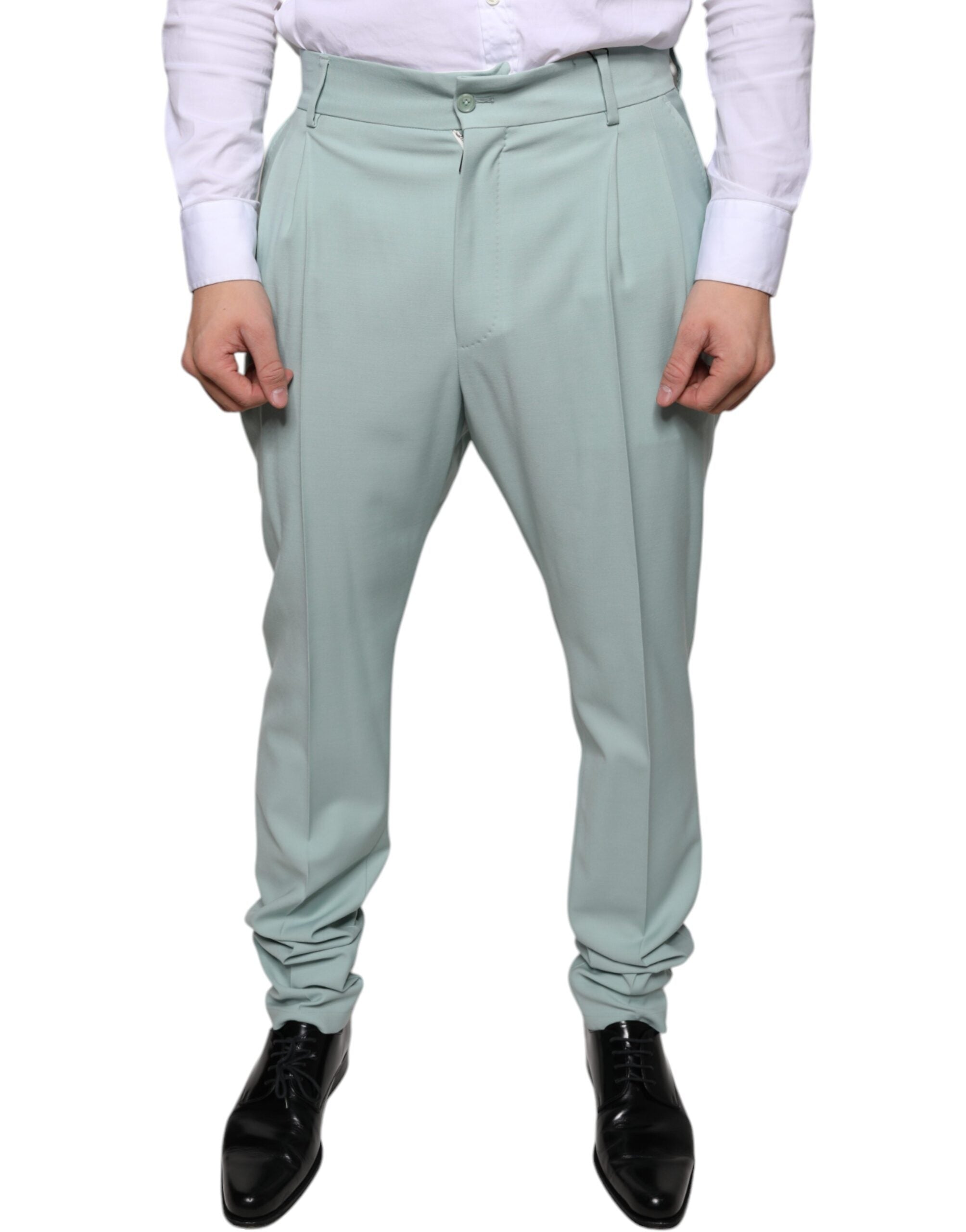 Mint green cotton dress pants by Dolce & Gabbana, tailored fit with classic waistband and side pockets, front view.