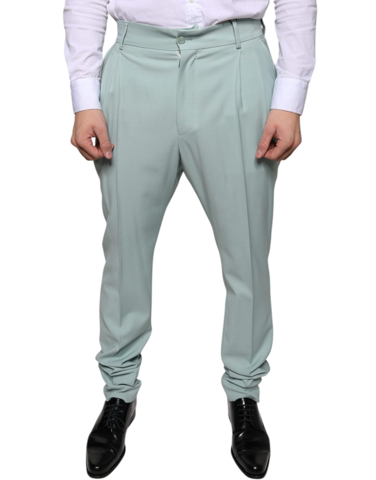 Mint green cotton dress pants by Dolce & Gabbana, tailored fit with classic waistband and side pockets, front view.