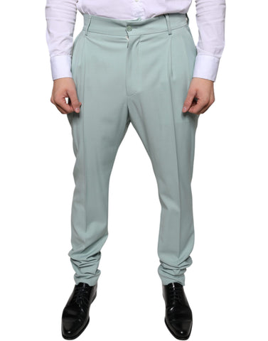 Mint green cotton dress pants by Dolce & Gabbana, tailored fit with classic waistband and side pockets, front view.