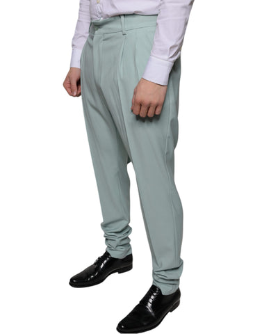 Mint green cotton dress pants by Dolce & Gabbana, tailored fit with classic waist and side pockets, shown on a model.