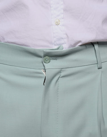 Mint green cotton dress pants by Dolce & Gabbana, tailored fit with belt loops and front pockets, displayed on a plain background.