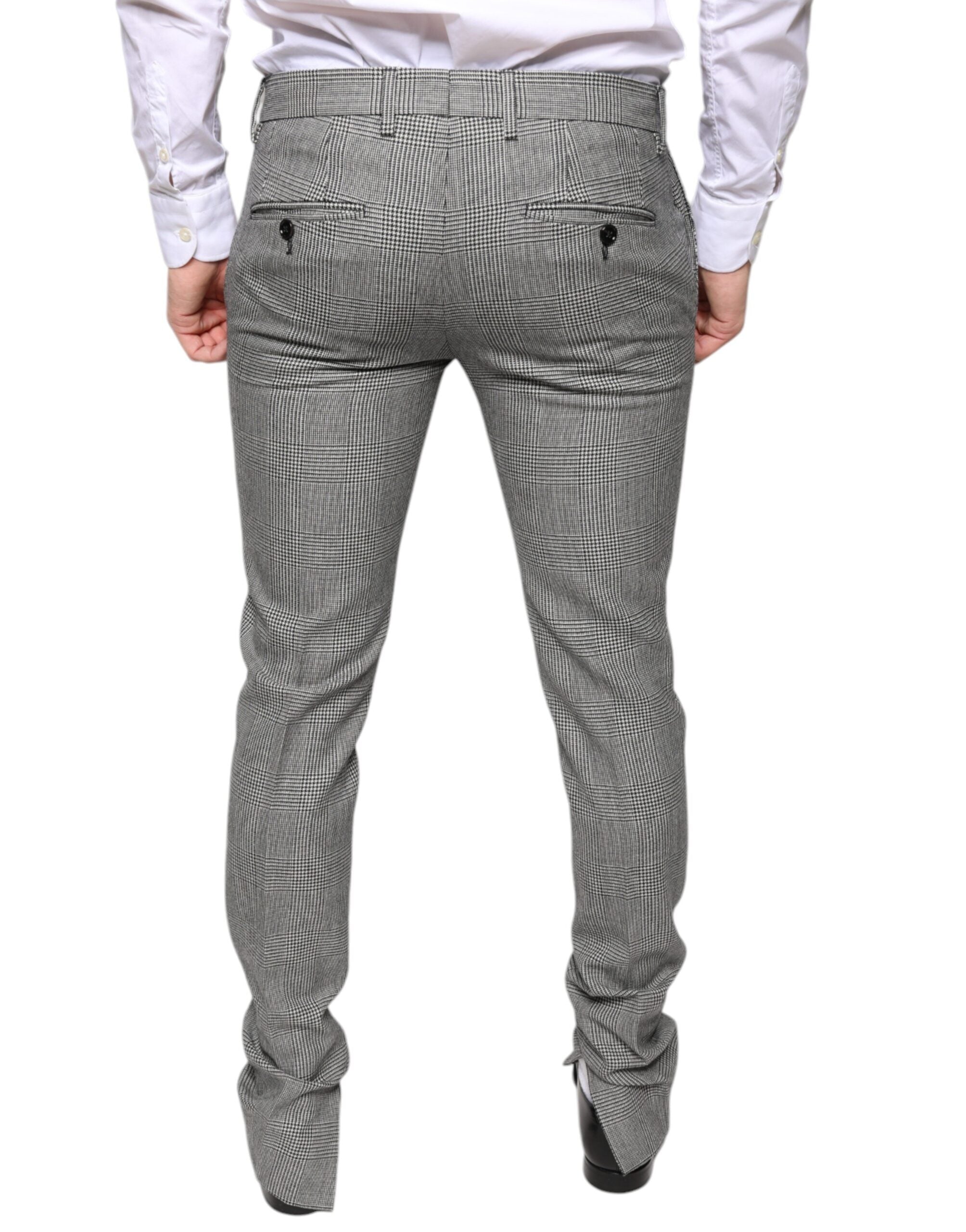 Gray check tartan wool skinny pants by Dolce & Gabbana displayed on a model.
