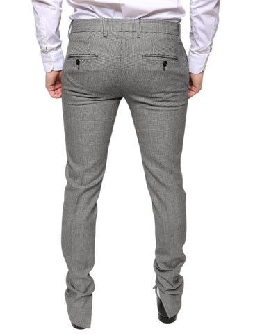 Gray check tartan wool skinny pants by Dolce & Gabbana displayed on a model.