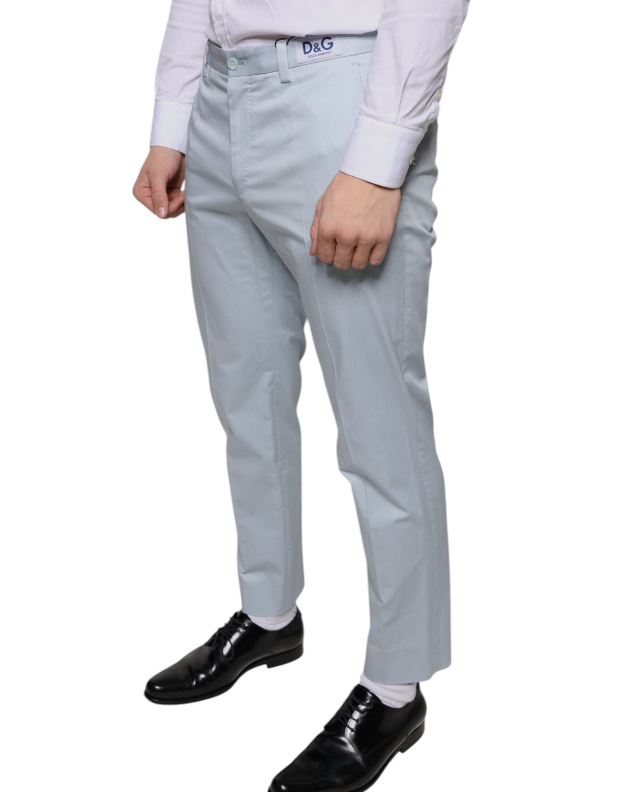 Light blue cotton dress pants by Dolce & Gabbana, tailored fit with sleek waistband and classic front pockets.