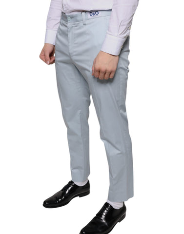 Light blue cotton dress pants by Dolce & Gabbana, tailored fit with sleek waistband and classic front pockets.