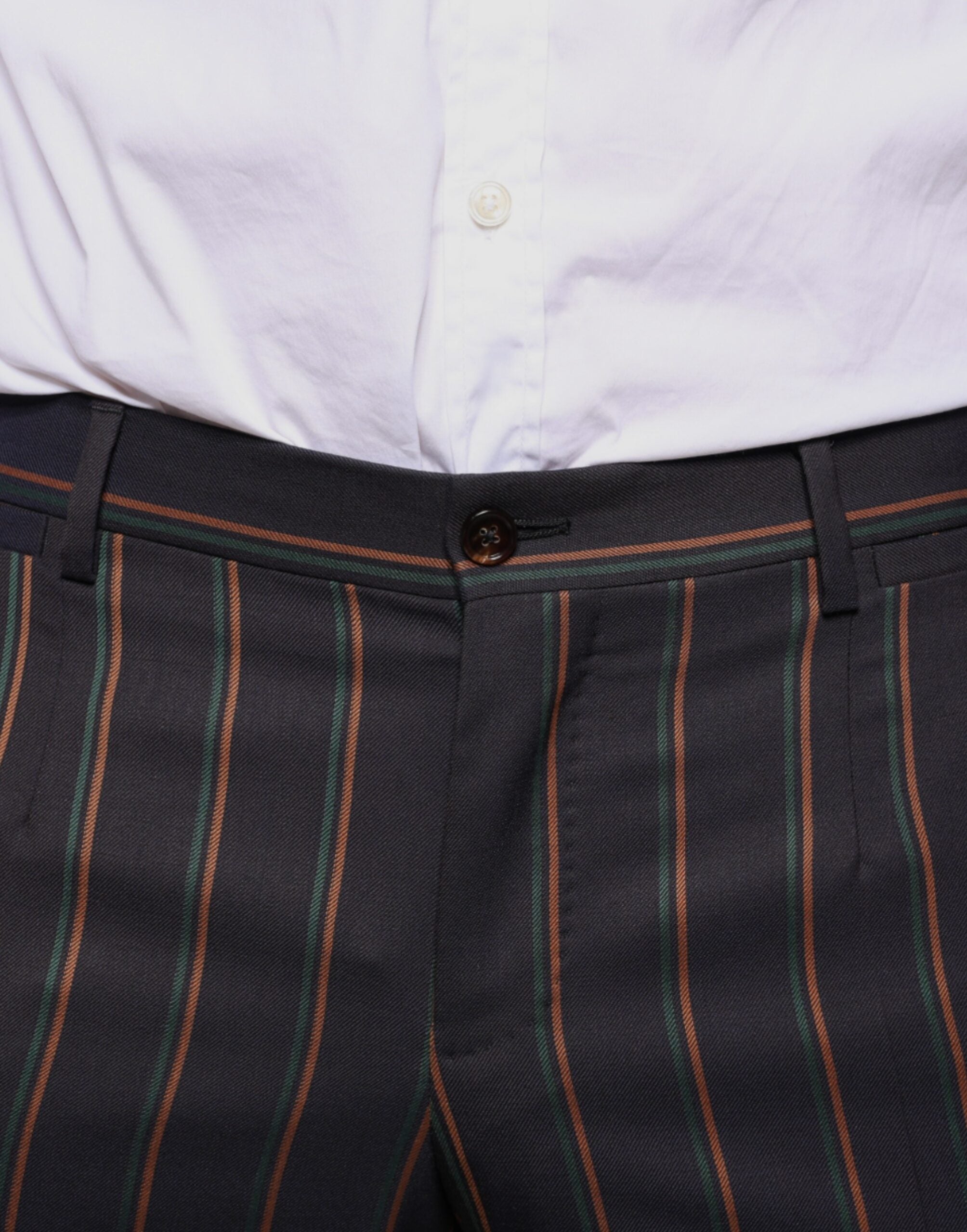 Brown striped skinny men's dress pants by Dolce & Gabbana, featuring a tailored fit and stylish pattern.