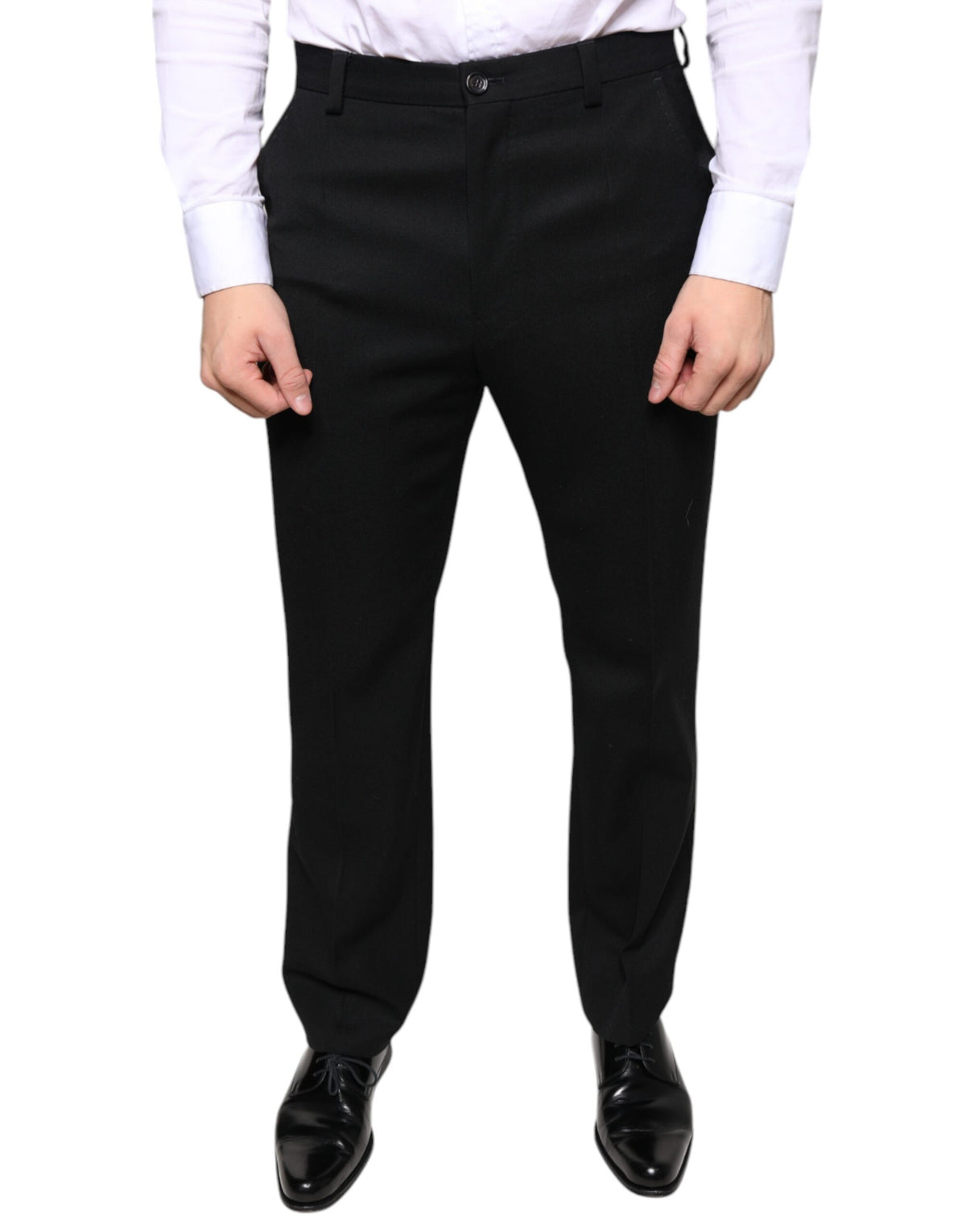 Black wool skinny men's dress pants by Dolce & Gabbana, tailored fit with sleek style and classic design.
