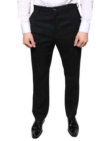 Black wool skinny men's dress pants by Dolce & Gabbana, tailored fit with sleek style and classic design.