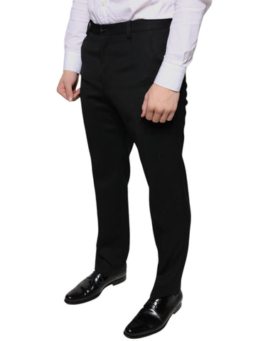 Black wool skinny men's dress pants by Dolce & Gabbana, tailored fit with smooth fabric and classic ankle length.