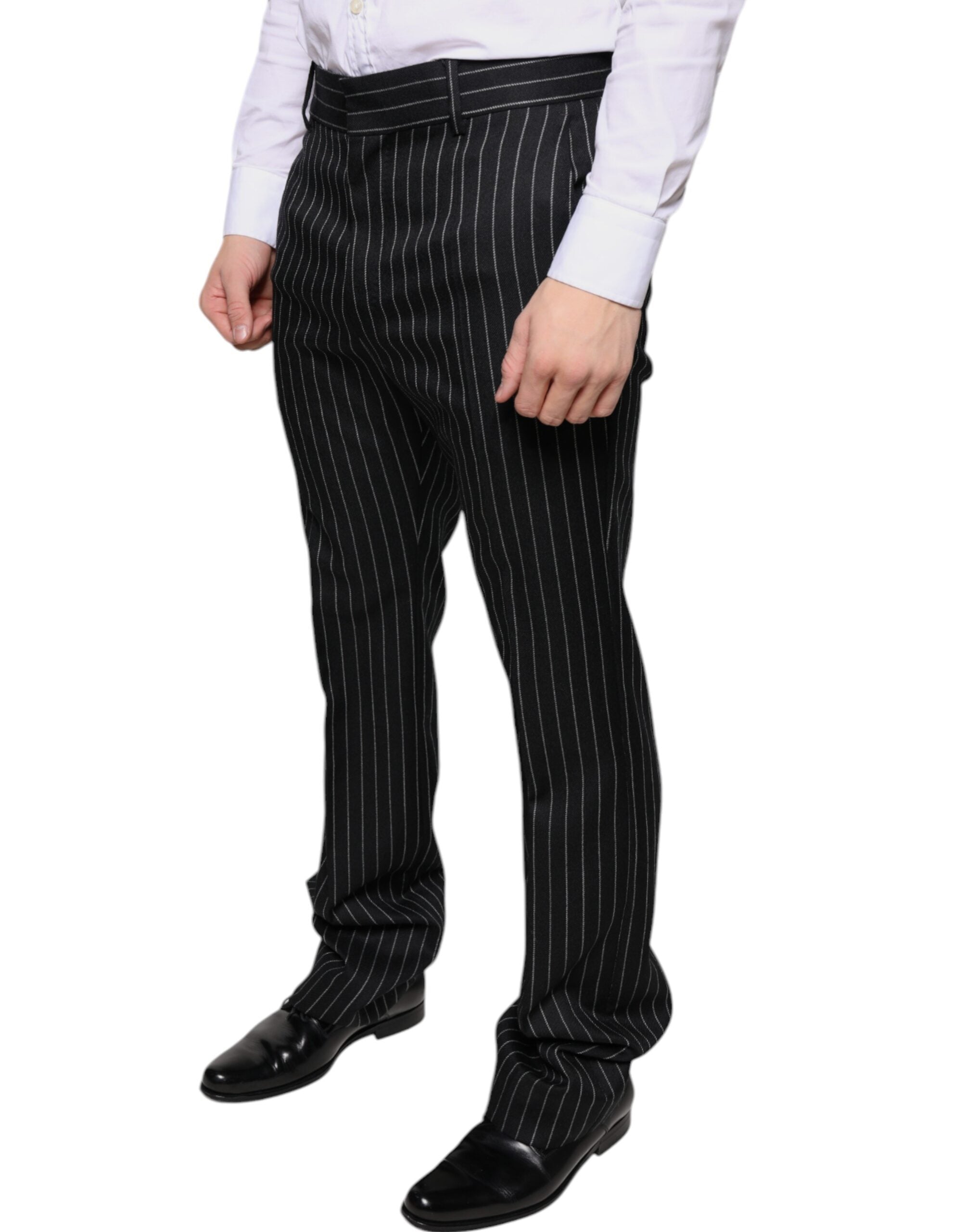 Black striped skinny men's dress pants by Dolce & Gabbana, featuring a tailored fit and sleek design.