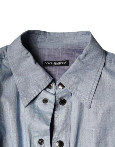 Light blue cotton button-down casual shirt by Dolce & Gabbana, displayed on a hanger showing front view and collar details.