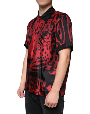 Red leopard print silk button-down casual shirt by Dolce & Gabbana, with a classic collar and long sleeves.