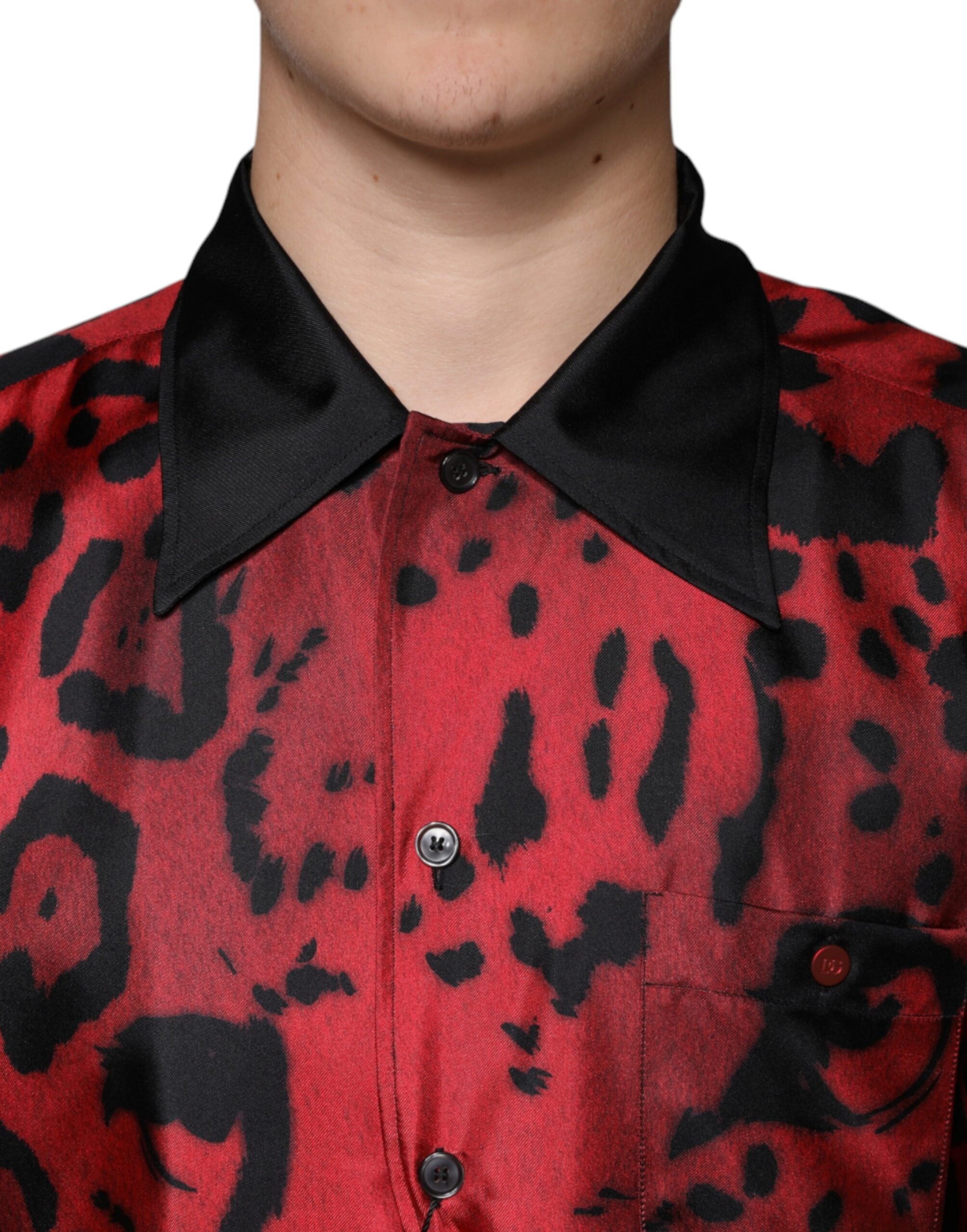 Red leopard print silk button-down casual shirt by Dolce & Gabbana, featuring a classic collar and long sleeves.