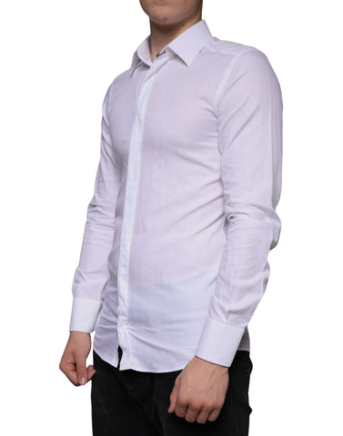 White cotton men's formal dress shirt by Dolce & Gabbana, featuring a classic gold-button design and tailored fit.