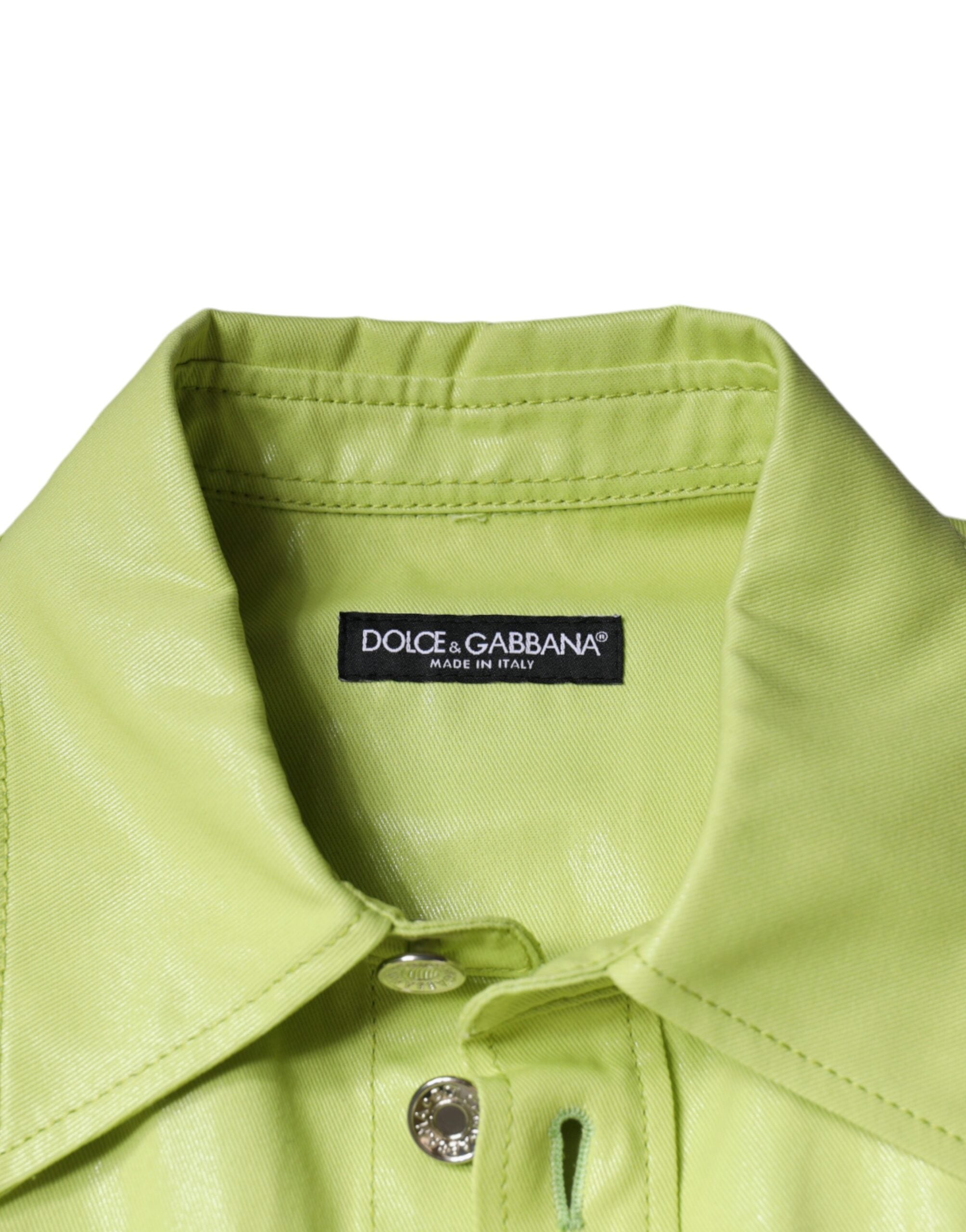 Green cotton collared men's button-down shirt by Dolce & Gabbana, displayed on a hanger with visible front buttons and collar detail.