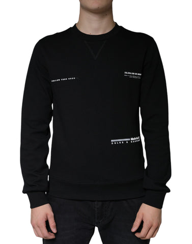 Black Dolce & Gabbana logo print crewneck sweatshirt with long sleeves and ribbed cuffs, displayed on a plain background.