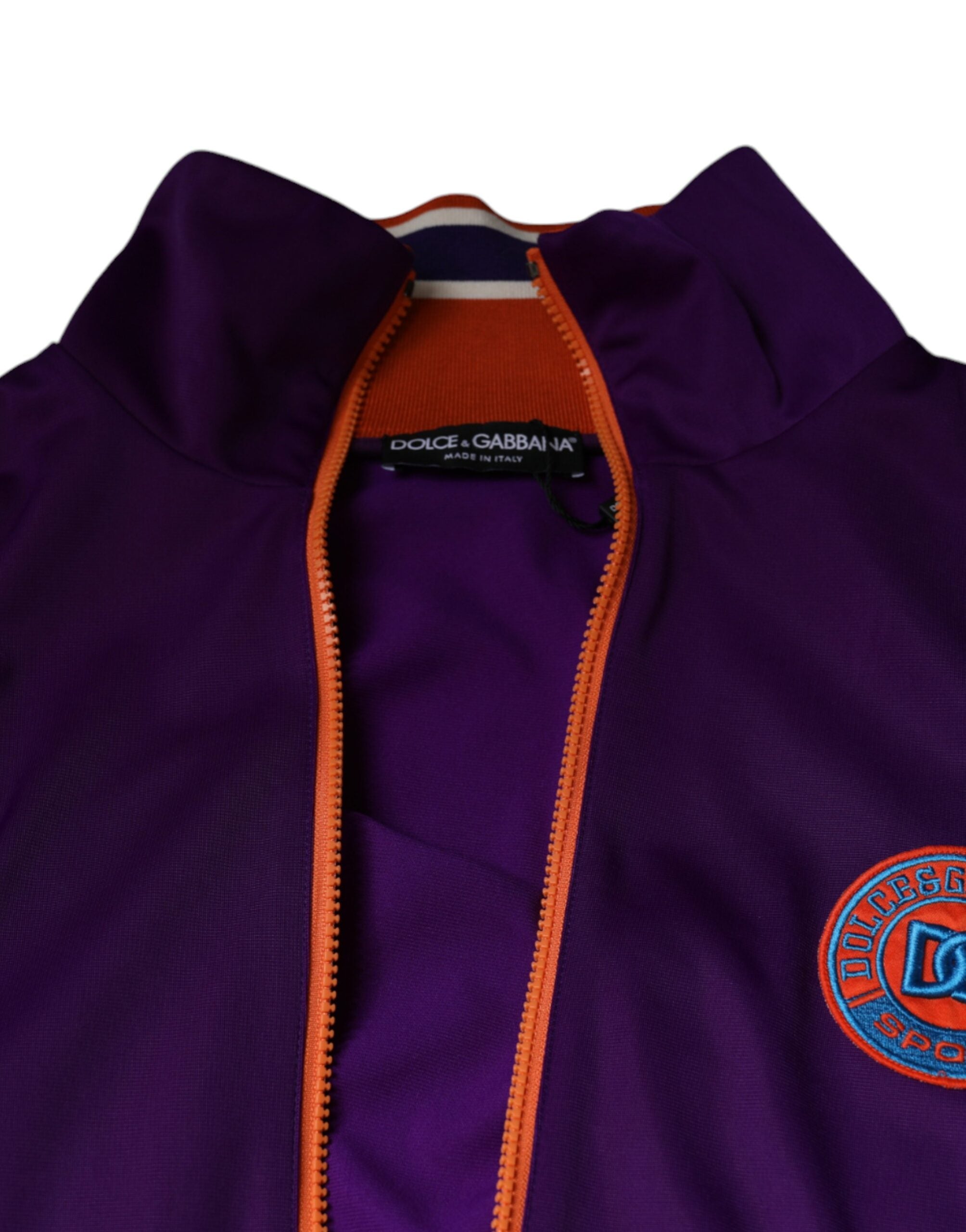 Purple polyester full-zip long sleeve sweater by Dolce & Gabbana, shown front view with collar and zipper detail.