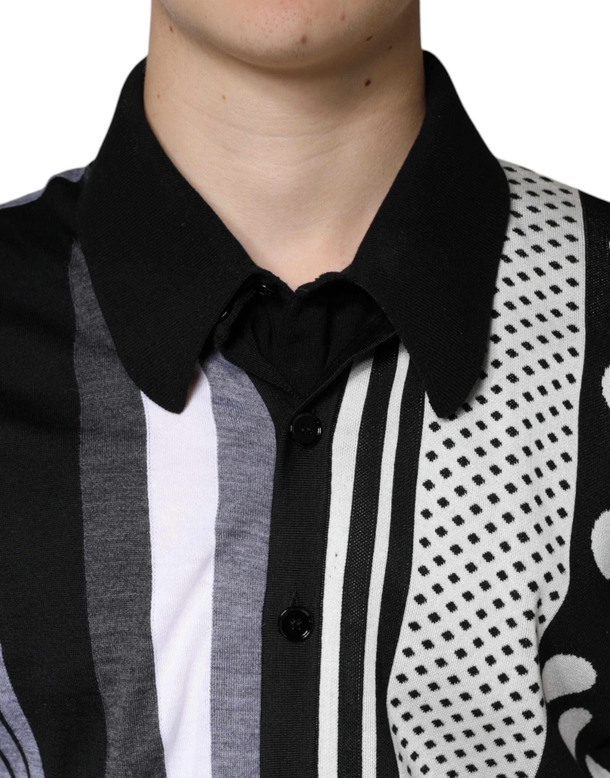 Black and white polka dot collared polo T-shirt by Dolce & Gabbana, featuring a classic polo design with a stylish polka dot pattern.