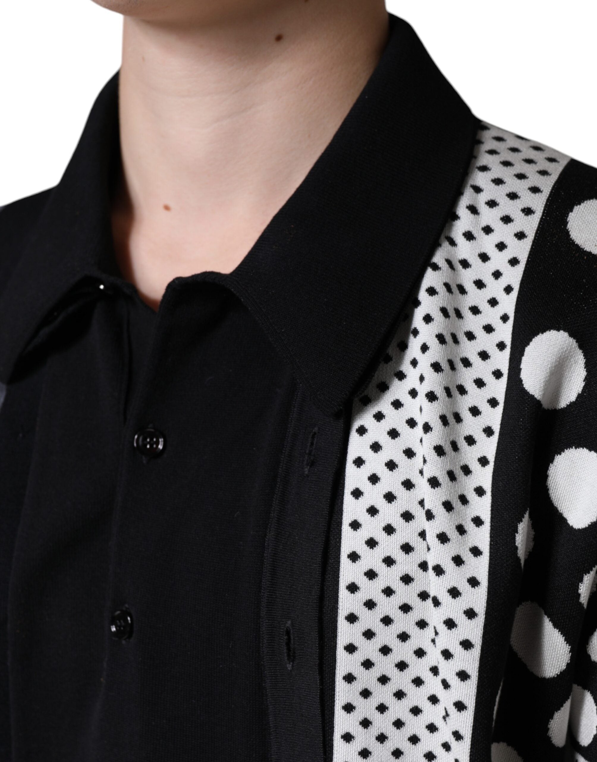 Black and white polka dot collared polo T-shirt by Dolce & Gabbana, featuring a classic polo design with a stylish polka dot pattern.