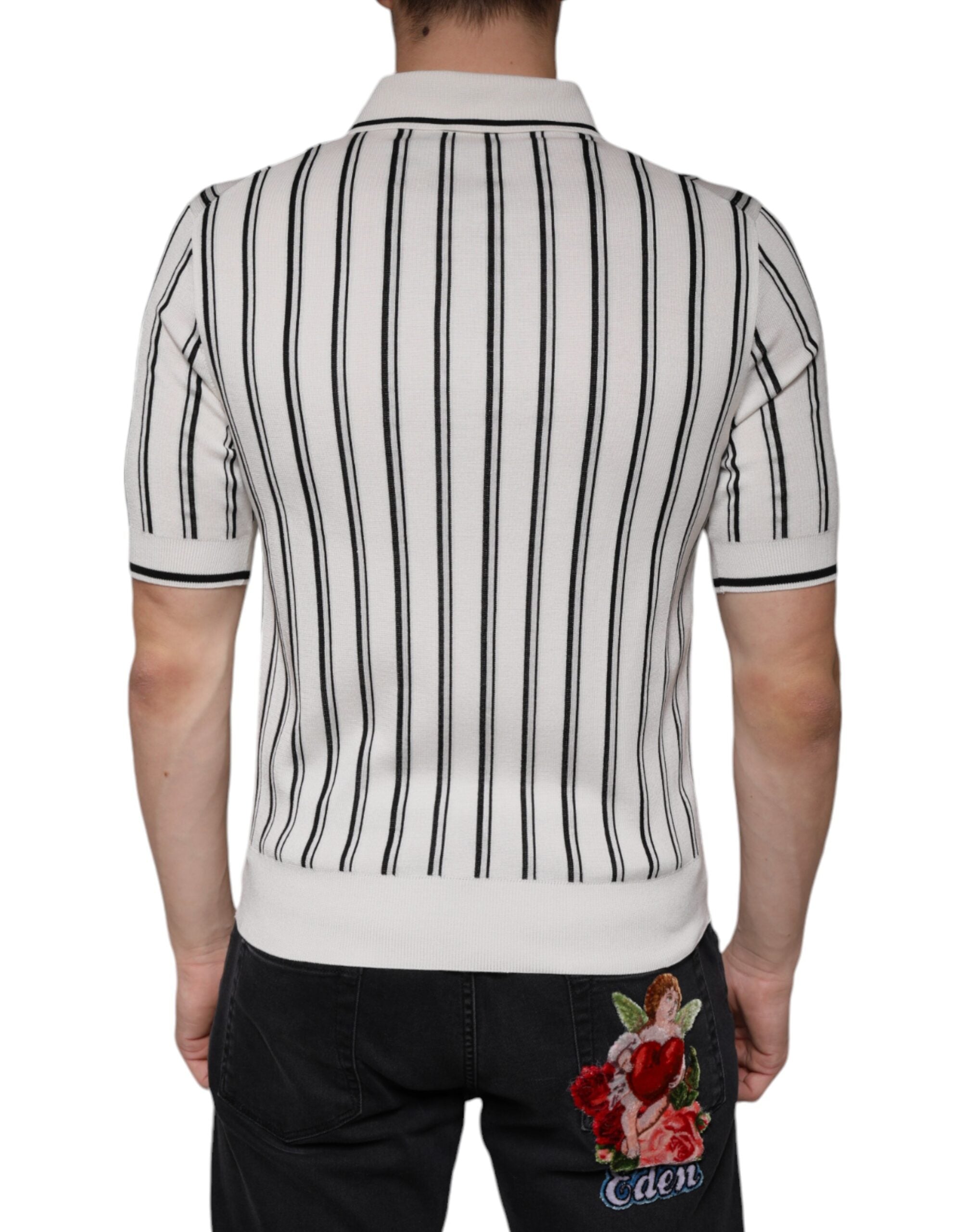 White and black striped Dolce & Gabbana short sleeve polo T-shirt displayed on a hanger.