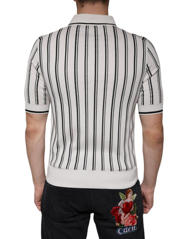 White and black striped Dolce & Gabbana short sleeve polo T-shirt displayed on a hanger.