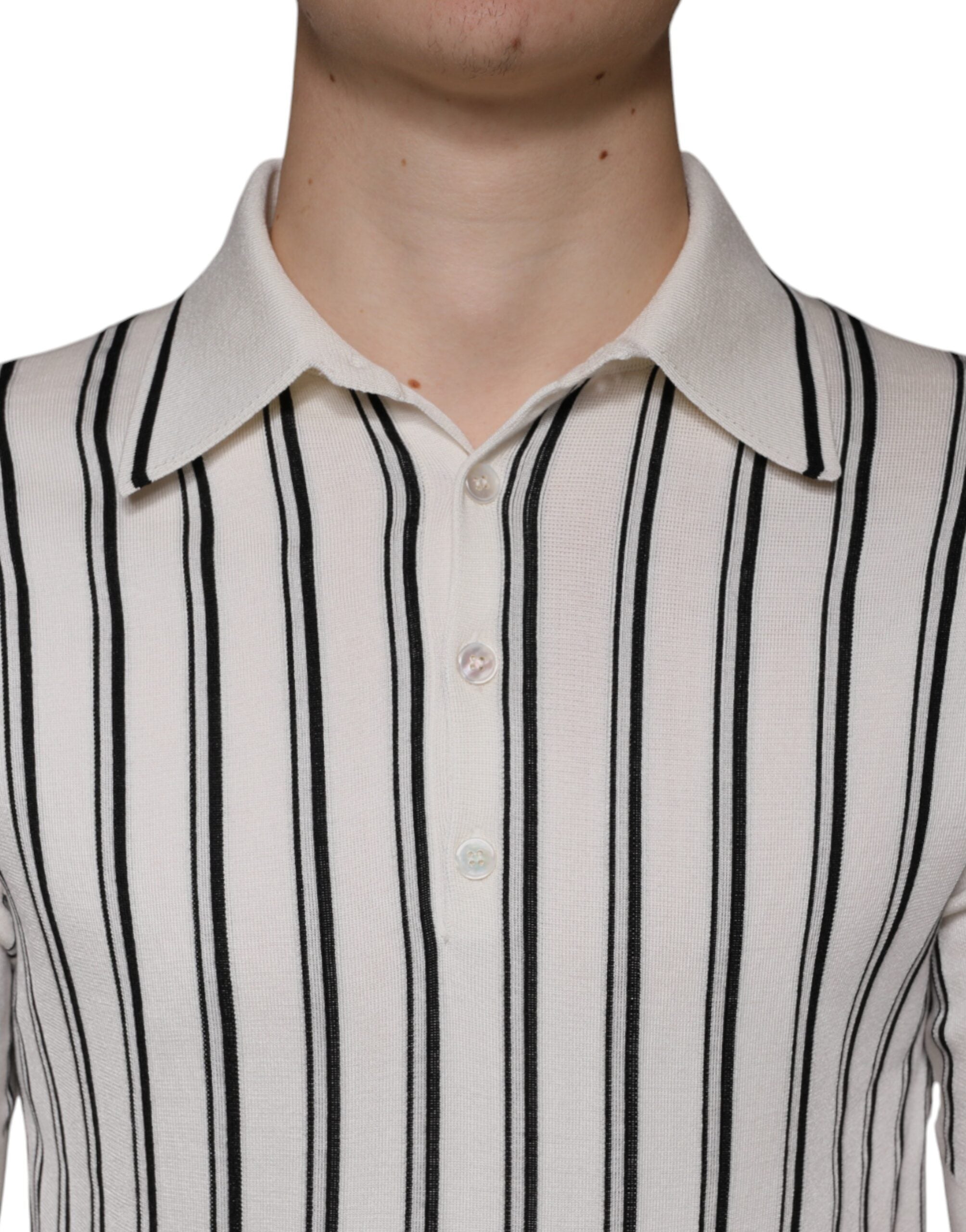 White and black stripe polo shirt with short sleeves by Dolce & Gabbana, featuring a classic collar and subtle branding.