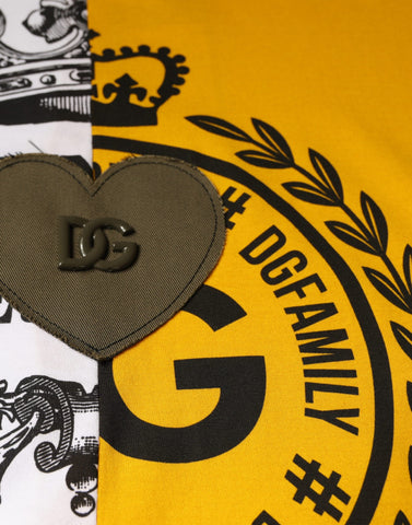 White Dolce & Gabbana short sleeve T-shirt with yellow logo print, casual crew neck design, front view showing logo detail.