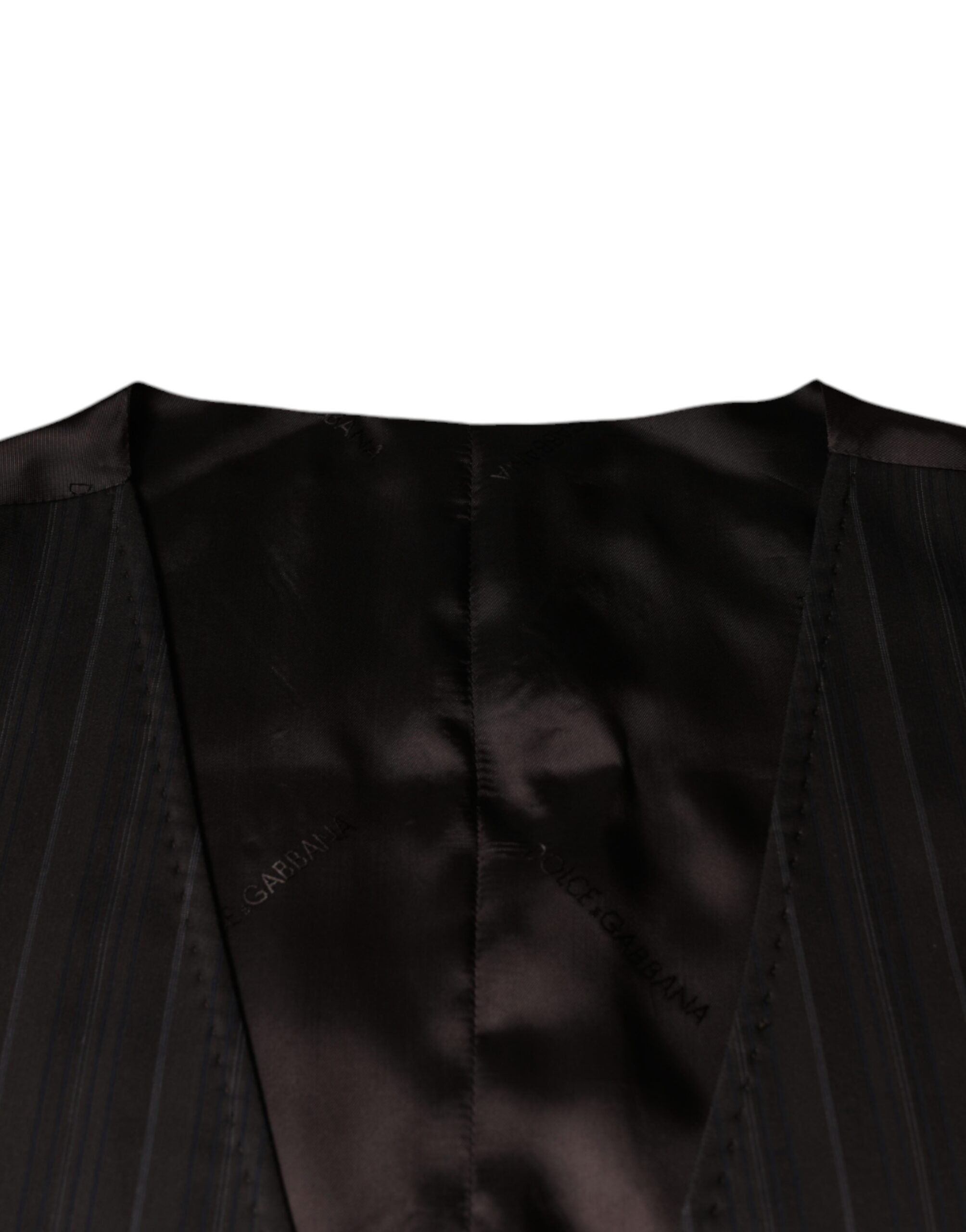 Black cotton waistcoat dress by Dolce & Gabbana, formal vest with tailored fit and classic design, shown on a model.