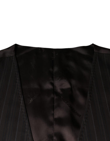 Black cotton waistcoat dress by Dolce & Gabbana, formal vest with tailored fit and classic design, shown on a model.