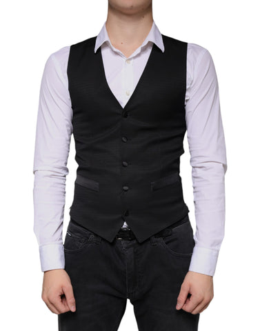 Black wool waistcoat dress by Dolce & Gabbana, formal vest with tailored fit and classic design, suitable for elegant occasions.