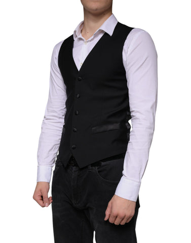 Black wool waistcoat dress by Dolce & Gabbana, formal vest with tailored fit and sleek design, suitable for elegant occasions.