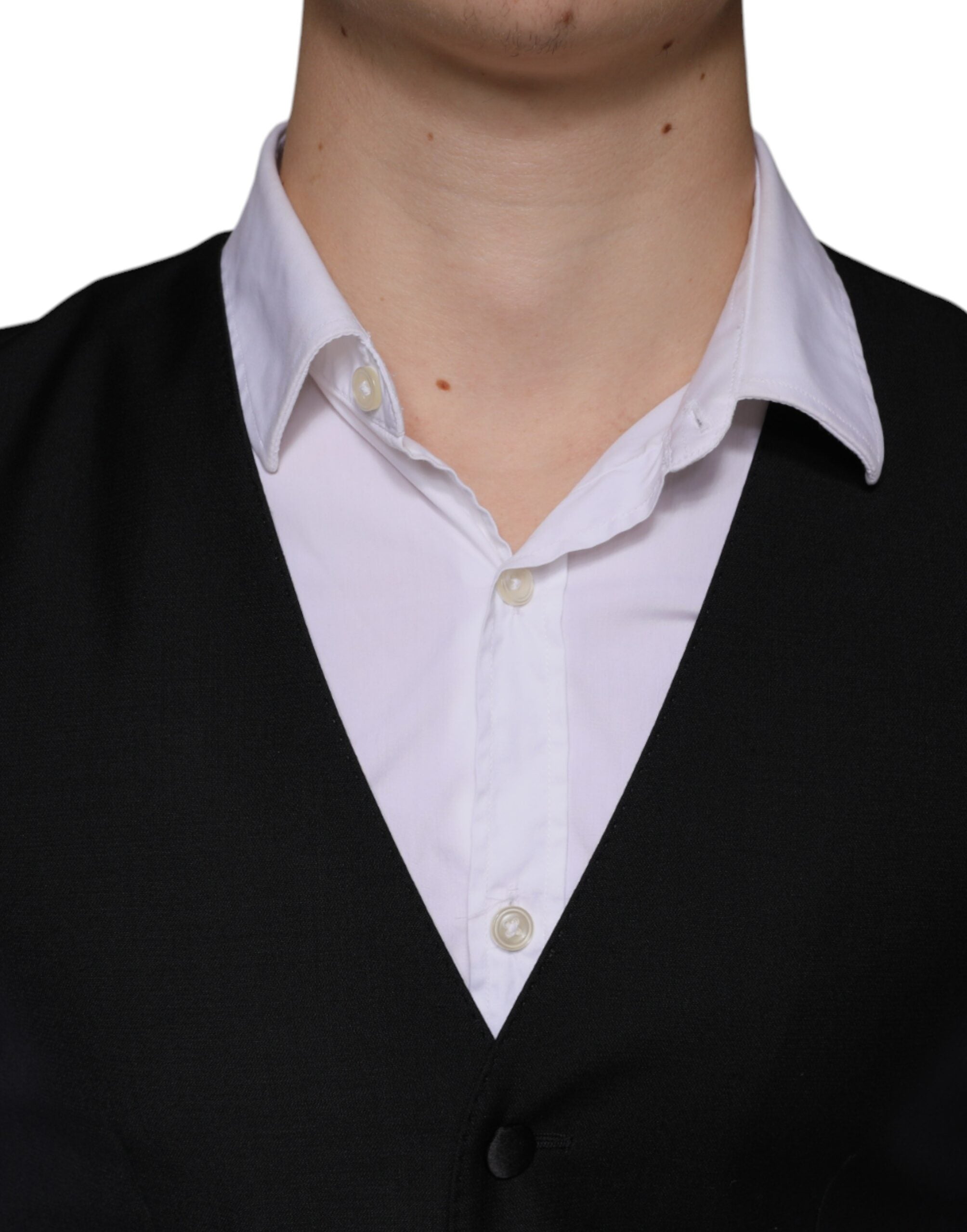 Black wool waistcoat dress by Dolce & Gabbana, formal vest with tailored fit and classic design, displayed on a hanger.