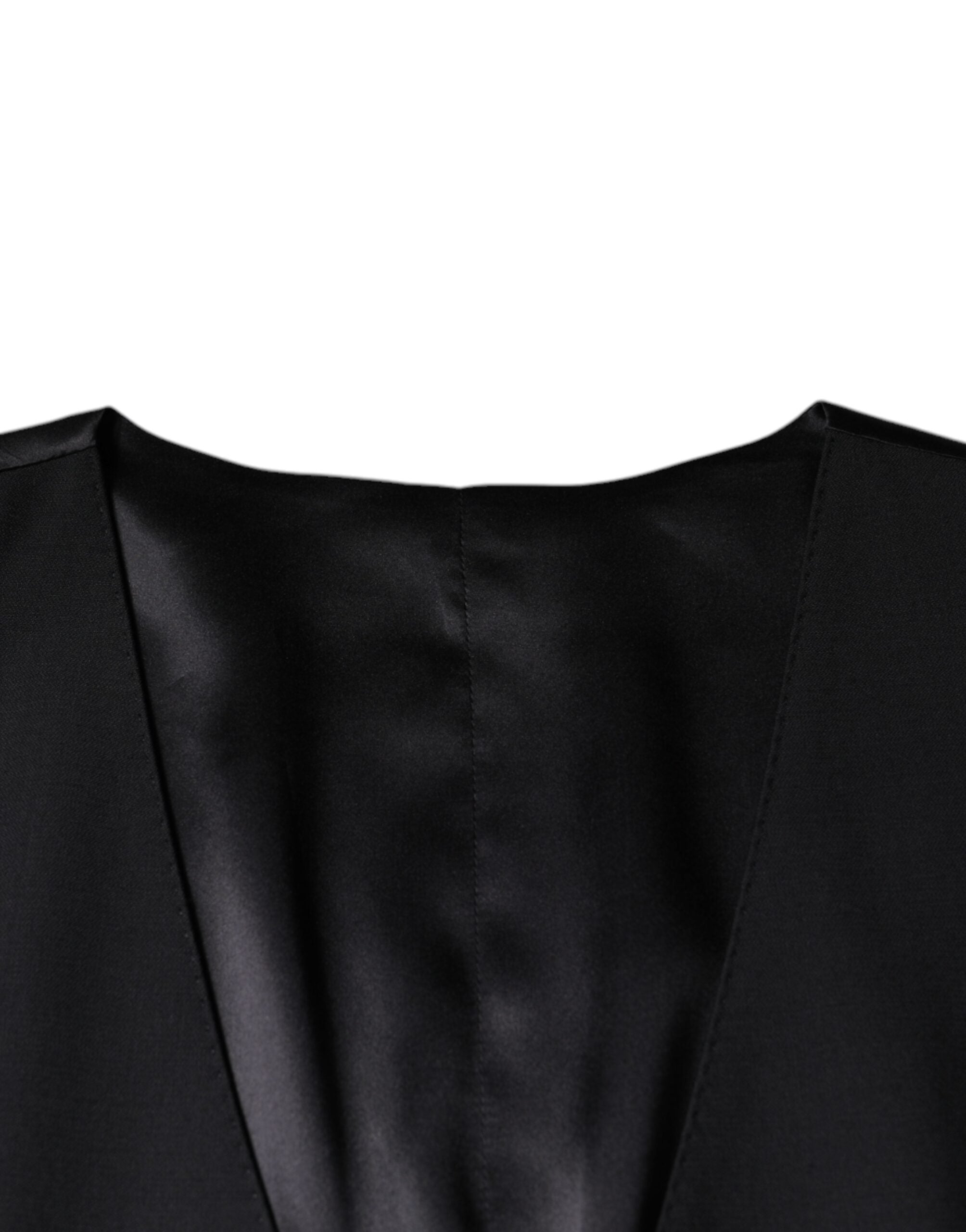 Black wool waistcoat dress by Dolce & Gabbana, formal vest with tailored fit and classic design, suitable for elegant occasions.