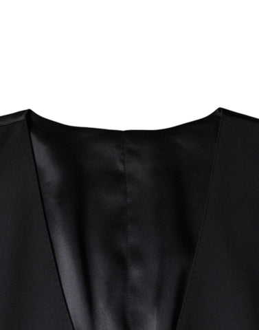Black wool waistcoat dress by Dolce & Gabbana, formal vest with tailored fit and classic design, suitable for elegant occasions.