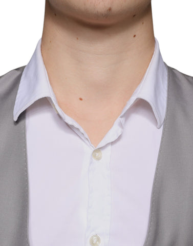 Light gray wool formal dress waistcoat vest by Dolce & Gabbana, tailored fit with button closure and classic design.