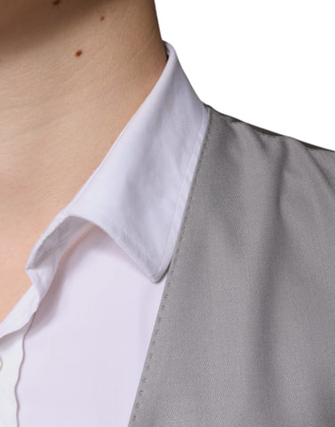 Light gray wool formal dress waistcoat vest by Dolce & Gabbana, tailored fit with classic lapel and button details.