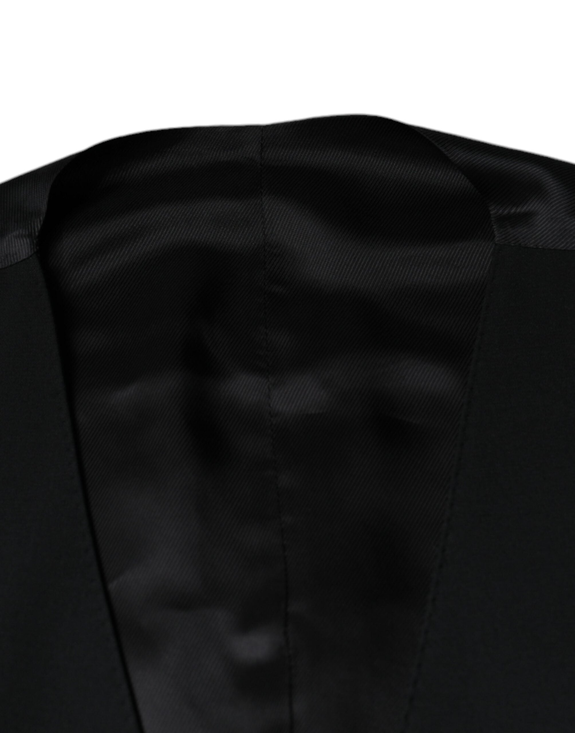 Black wool formal men's waistcoat vest by Dolce & Gabbana, tailored fit with classic lapel and button closure.