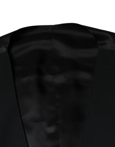 Black wool formal men's waistcoat vest by Dolce & Gabbana, tailored fit with classic lapel and button closure.