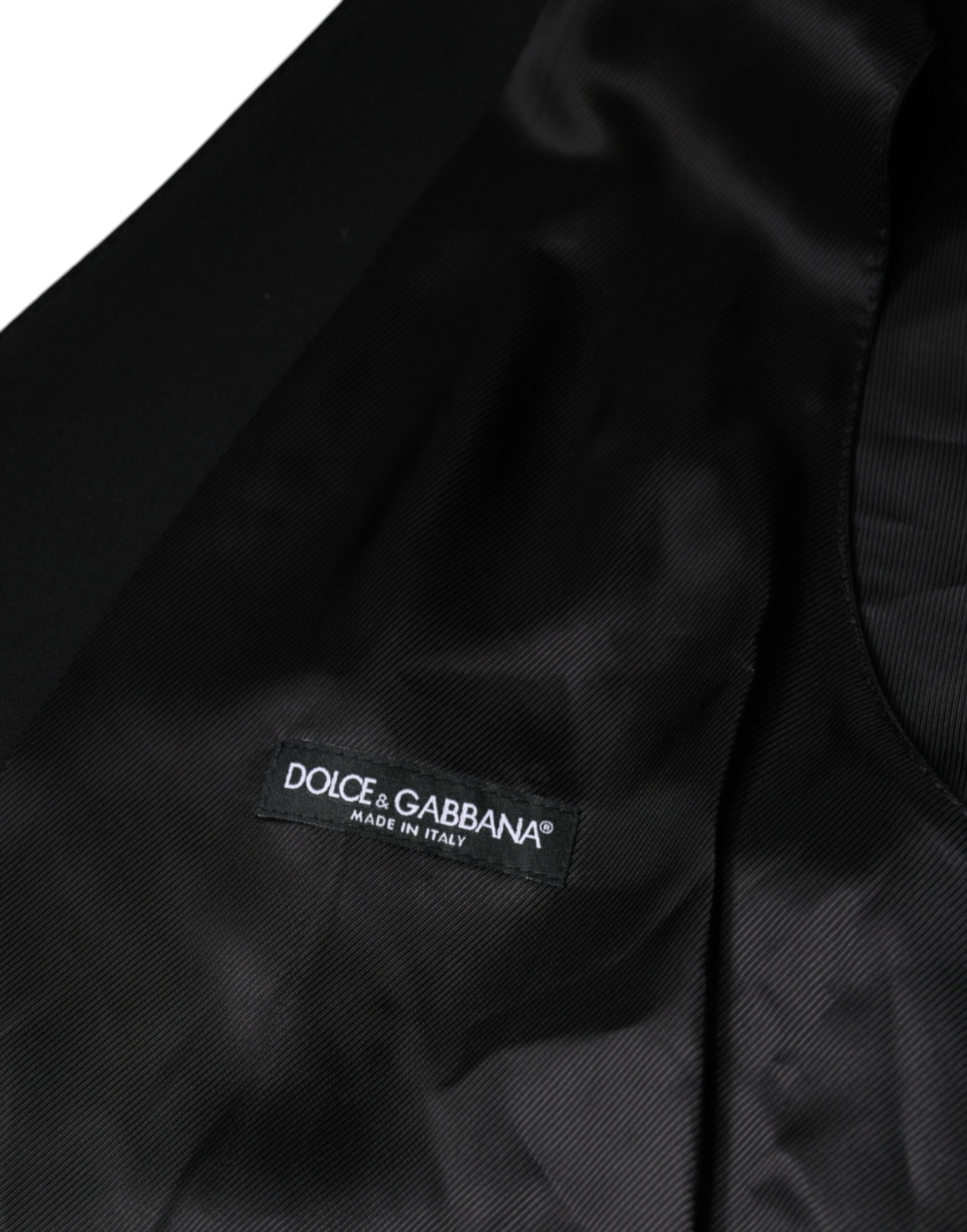 Black wool formal men's waistcoat vest by Dolce & Gabbana, featuring a tailored fit and classic design.