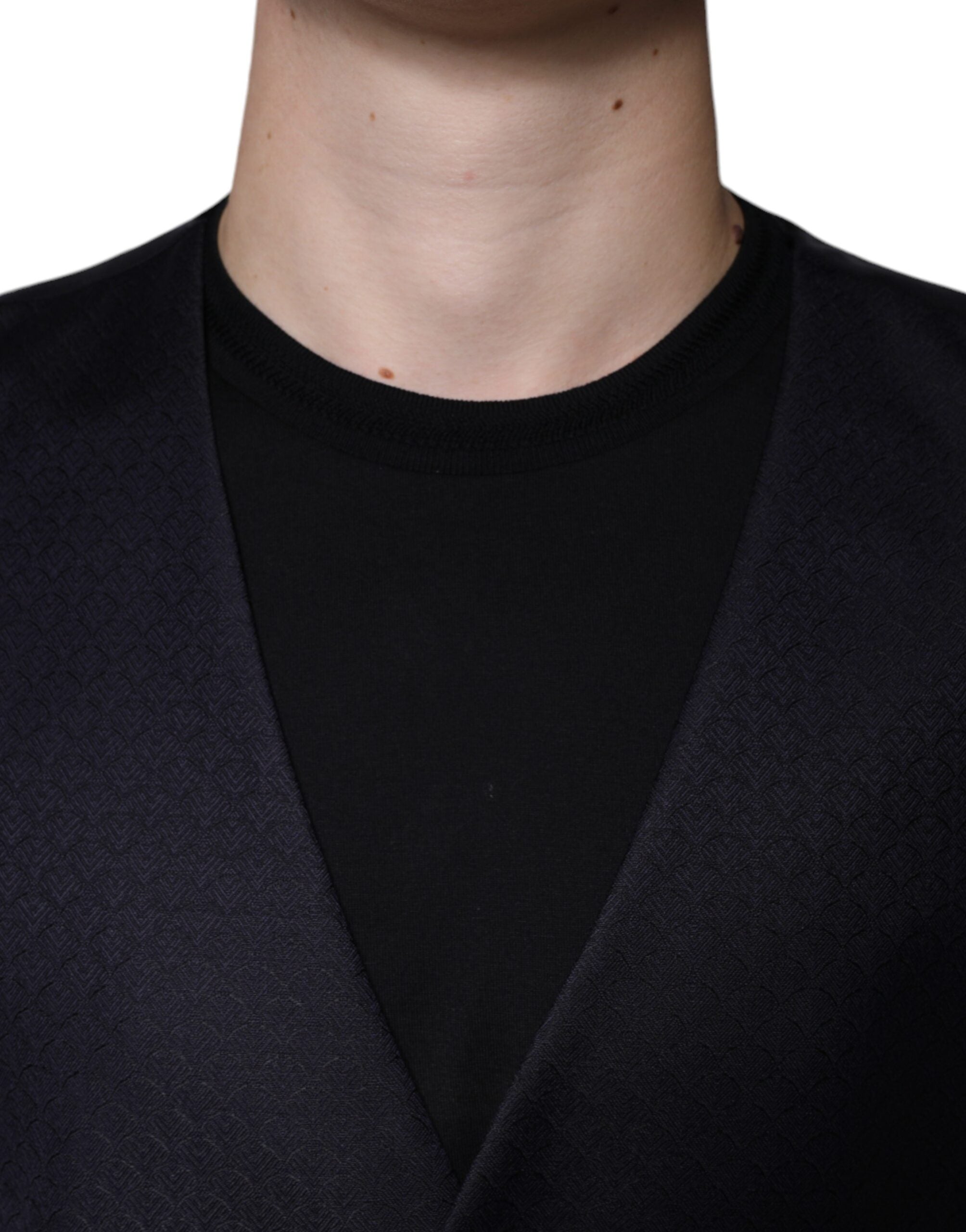 Black wool waistcoat dress by Dolce & Gabbana, formal vest style, featuring tailored fit and sleek design, shown on a model.