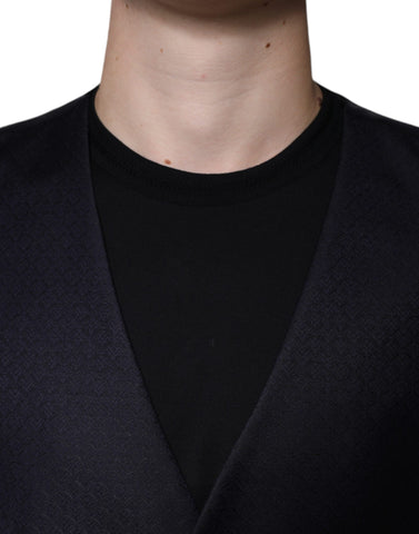 Black wool waistcoat dress by Dolce & Gabbana, formal vest style, featuring tailored fit and sleek design, shown on a model.