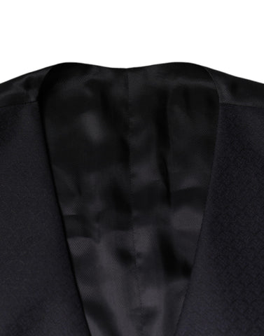 Black wool waistcoat dress by Dolce & Gabbana, formal vest with tailored fit and classic design, suitable for elegant occasions.