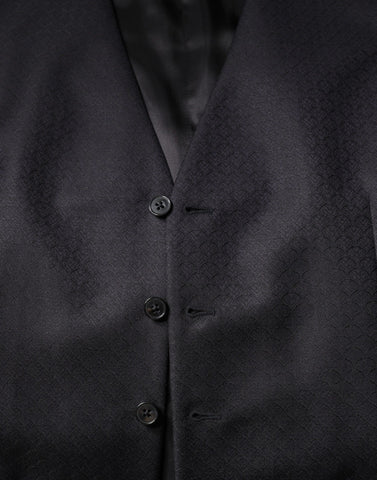 Black wool waistcoat dress by Dolce & Gabbana, formal vest with tailored fit and classic design, shown on a model.