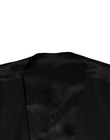 Black wool waistcoat dress by Dolce & Gabbana, formal vest with tailored fit and button details, suitable for elegant occasions.