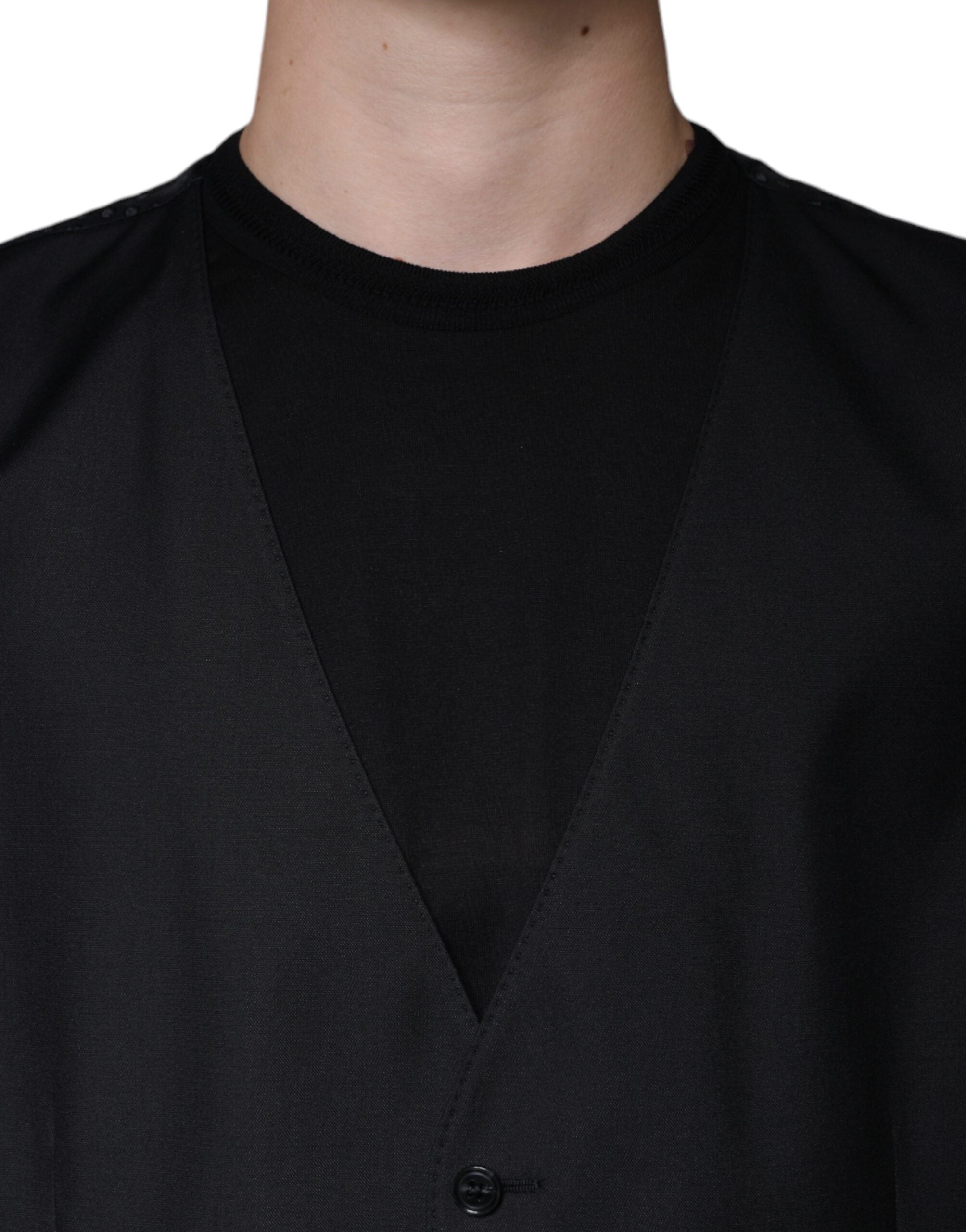 Black wool waistcoat dress by Dolce & Gabbana, formal vest style with tailored fit and classic design, displayed on a mannequin.