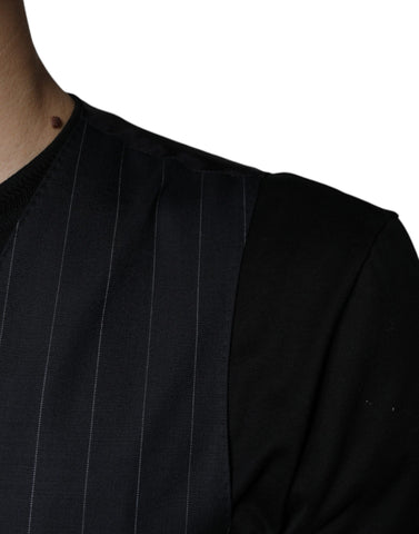Black leather waistcoat dress by Dolce & Gabbana, featuring a sleek, formal vest style with tailored fit and stylish details.