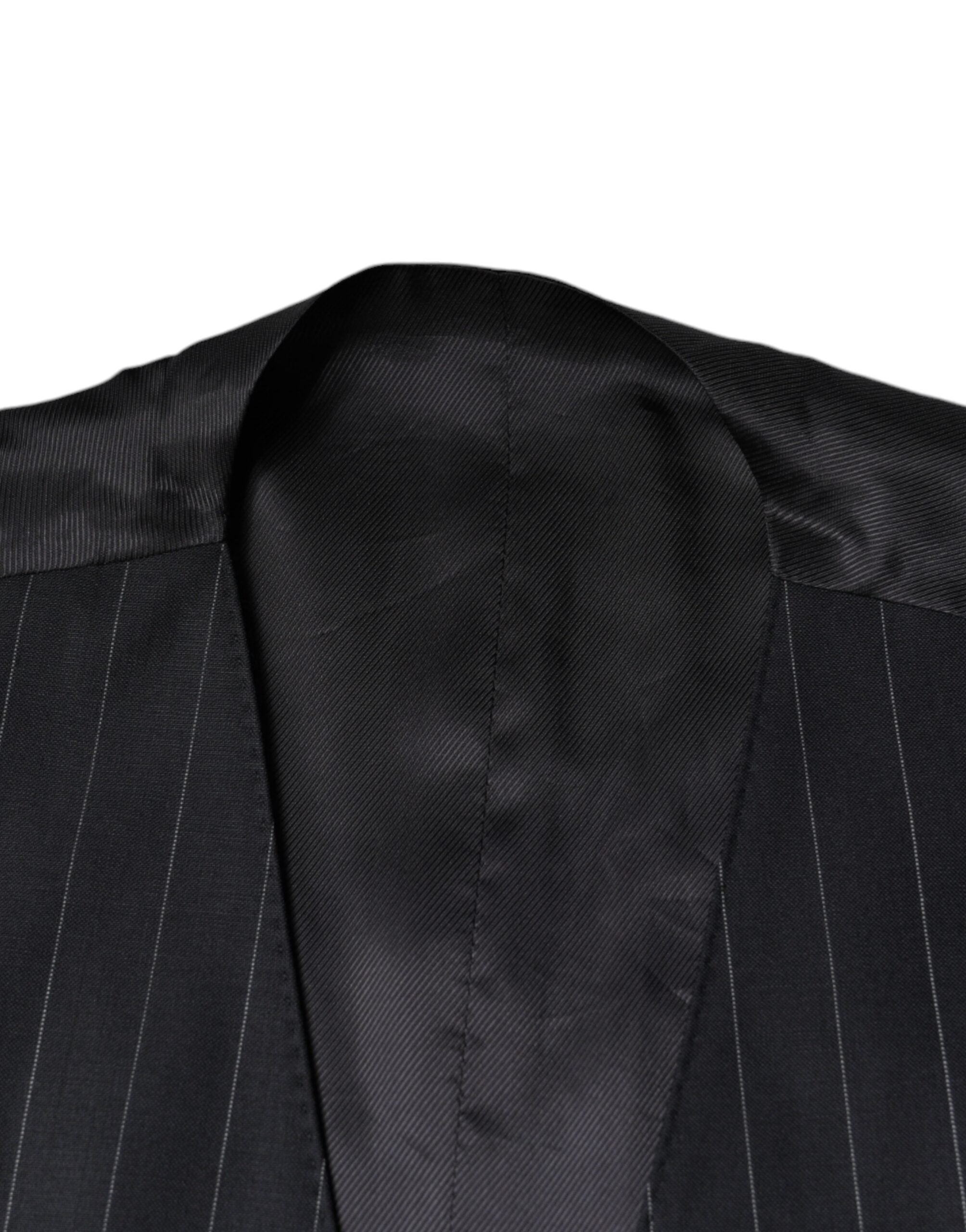 Black leather waistcoat dress by Dolce & Gabbana, featuring a sleek formal vest design with tailored fit and stylish details.